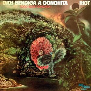 Riot - God Bless Conchita = Dios Bendiga A Conchita-0